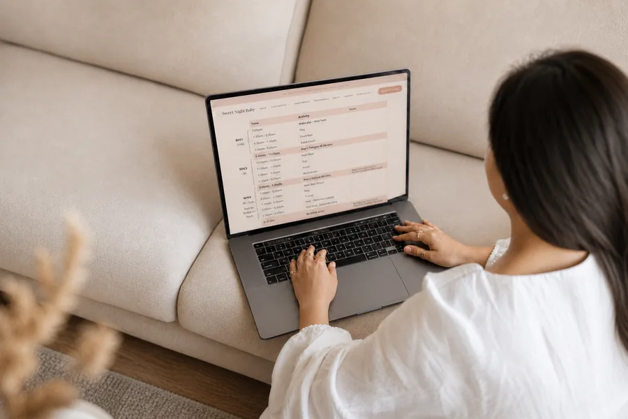 Parent completing the free Sweet Night Baby sleep assessment on a laptop